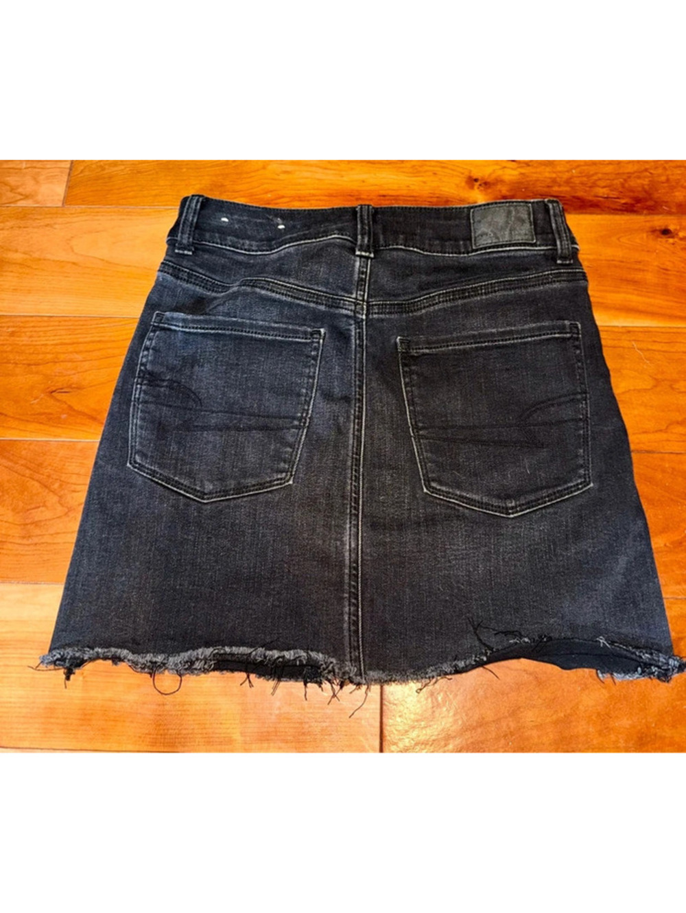 American Eagle black jean mini distressed skirt size 2